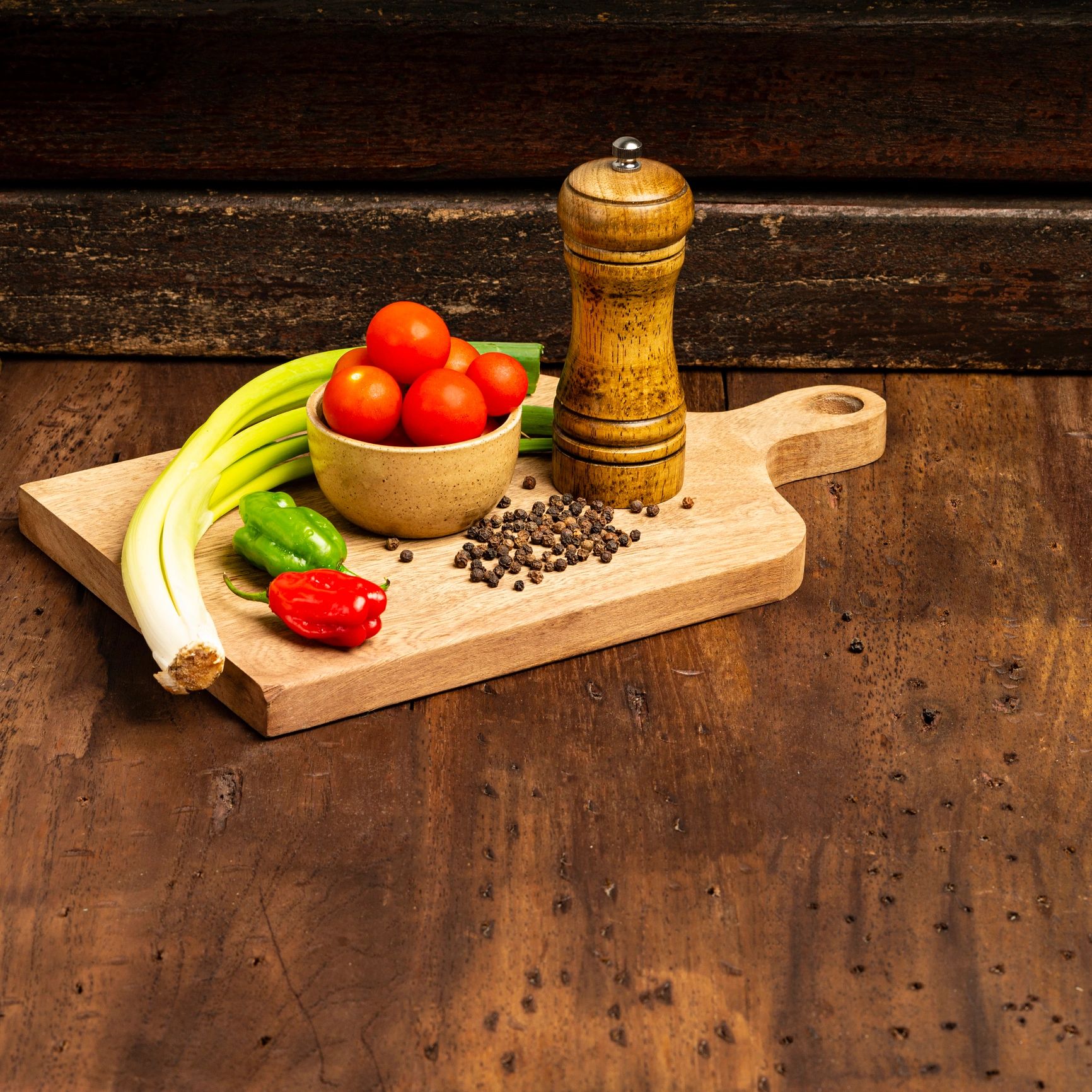 Rustic kitchen scene with cutting board and ingredients