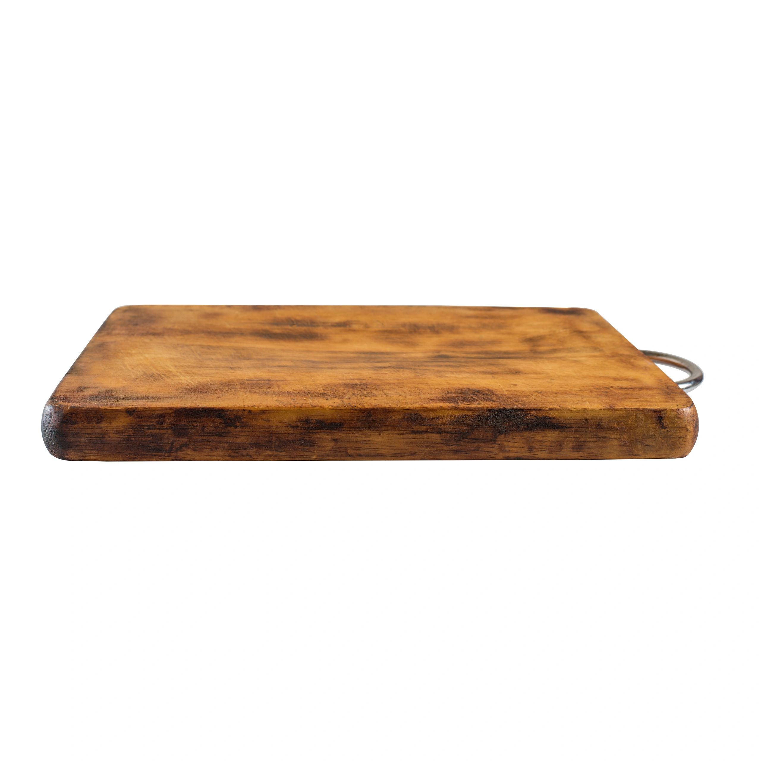 Weathered wooden cutting board close-up