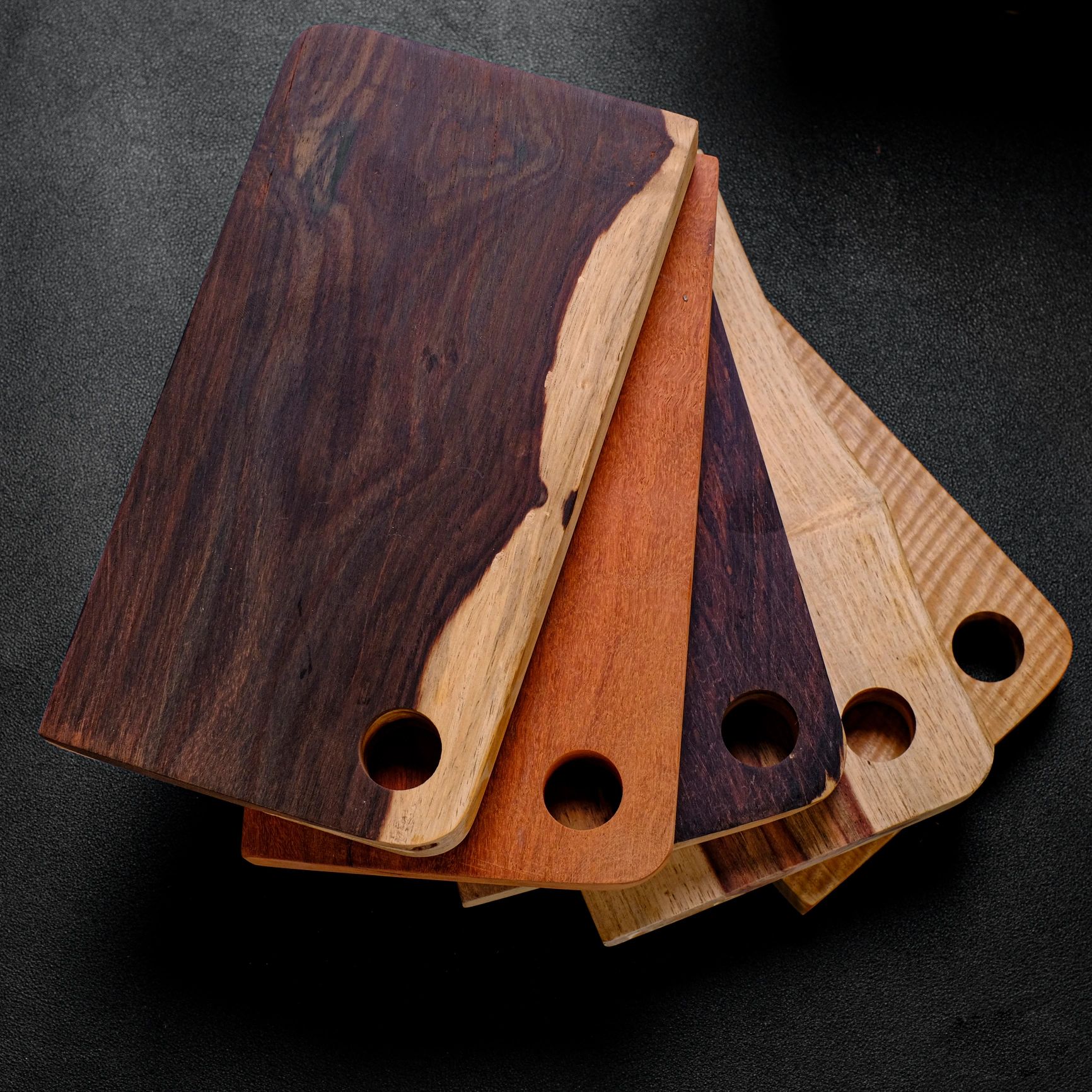 Handcrafted hardwood cutting board with contrasting wood tones