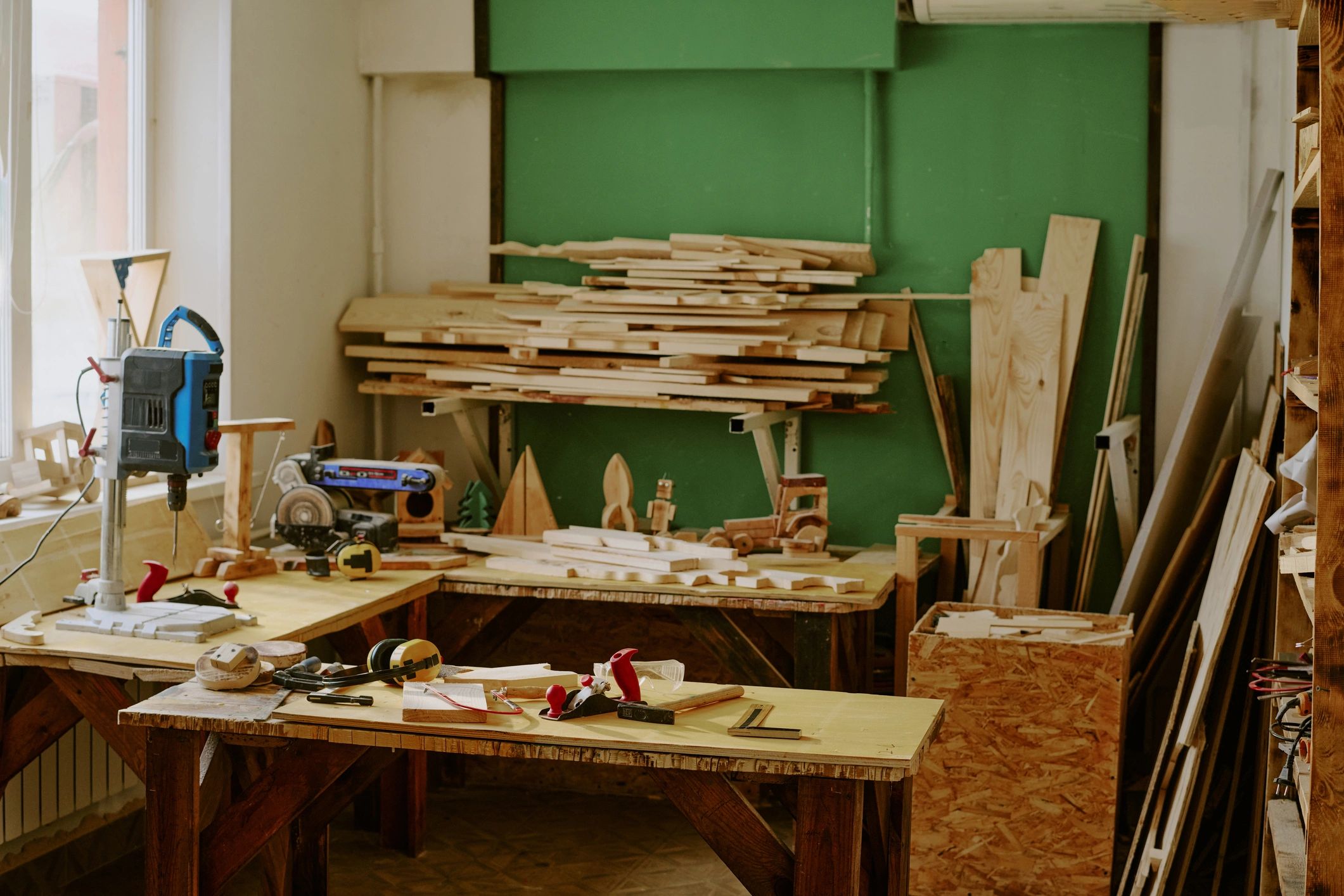 Woodworking workshop with lumber and tools